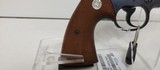 Used Colt Official Police 38 special 5" barrelblue with brown grips good condition - 14 of 19