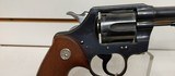 Used Colt Official Police 38 special 5" barrelblue with brown grips good condition - 16 of 19