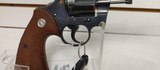 Used Colt Official Police 38 special 5" barrelblue with brown grips good condition - 19 of 19