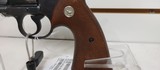 Used Colt Official Police 38 special 5" barrelblue with brown grips good condition - 4 of 19