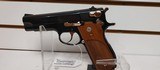 Used Smith and Wesson Model 39 4" barrel 9mm gold finish hardware (NO MAGAZINE)blue and gold with brown grips very good condition - 1 of 19
