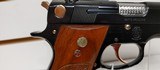 Used Smith and Wesson Model 39 4" barrel 9mm gold finish hardware (NO MAGAZINE)blue and gold with brown grips very good condition - 18 of 19