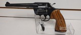 Used Colt Official Police 38 SPL6" barrel blue with wood grips good condition - 1 of 17