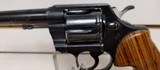 Used Colt Official Police 38 SPL6" barrel blue with wood grips good condition - 5 of 17