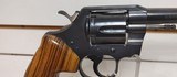 Used Colt Official Police 38 SPL6" barrel blue with wood grips good condition - 14 of 17