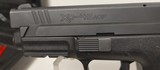 Used Springfield XD4545 ACP 4" barrel 213 roundmagazines hard plastic case good condition - 2 of 19