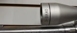 Used Savage 116 338 Winchester 22" barrel stainles with black synthetic stock tasco 3-9x40 scope bore=clean rifling=very good overall good condit - 11 of 25