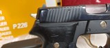 Used Sig P226 9 mm4" barrel2- 15 round mags black with gold accents original boxgood condition - 14 of 19