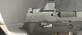New Sig Sauer 320
9mm 3.9" barrel
2 15 round magazines Romeo reflex site
manual hard plastic case new condition - 9 of 18