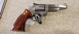 Used Smith & Wesson Model 66 357 magnum 4" barrel 6 shot stainless with brown grips very good condition - 13 of 17