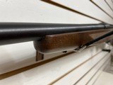 Used Savage 11030-06 wood stock with black receiver and barrel bore is clean good condition - 6 of 24