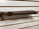 Used Savage 11030-06 wood stock with black receiver and barrel bore is clean good condition - 17 of 24