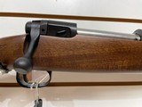 Used Savage 11030-06 wood stock with black receiver and barrel bore is clean good condition - 14 of 24