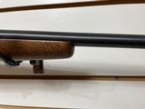 Used Savage 11030-06 wood stock with black receiver and barrel bore is clean good condition - 21 of 24