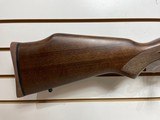Used Savage 11030-06 wood stock with black receiver and barrel bore is clean good condition - 5 of 24