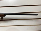 Used Savage 11030-06 wood stock with black receiver and barrel bore is clean good condition - 10 of 24