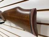 Used Savage 11030-06 wood stock with black receiver and barrel bore is clean good condition - 18 of 24