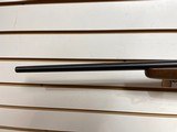 Used Savage 11030-06 wood stock with black receiver and barrel bore is clean good condition - 7 of 24