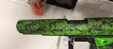 Used Iver Johnson G1911A145acp5" barrel Zombie Green Camo and Grips2 magazines hard plastic case lock manualvery good condition - 11 of 17