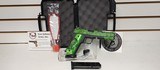 Used Iver Johnson G1911A145acp5" barrel Zombie Green Camo and Grips2 magazines hard plastic case lock manualvery good condition - 15 of 17