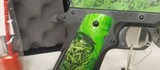 Used Iver Johnson G1911A145acp5" barrel Zombie Green Camo and Grips2 magazines hard plastic case lock manualvery good condition - 4 of 17