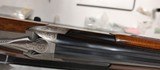 Used Browning 725 12 gauge 32" barrel 7 gnarled chokes 2 spare triggers spare sights with holder shims for adjustable comb tools etc used conditi - 11 of 25