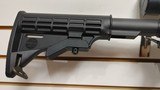 used AM-15 16" barrel muzzle break 5.56 1 30 round magazine nikon m-233 scope adjustable stock good condition - 22 of 25