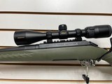 Used Ruger American 22-25021" threaded barrel nikon prostaff scope synthetic olive green stock very good condition - 2 of 21