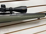 Used Ruger American 22-25021" threaded barrel nikon prostaff scope synthetic olive green stock very good condition - 9 of 21