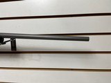 Used Ruger M77 Hawkeye 243 winchester23" barrelnikon buckmaster scope black synthetic stock good condition - 10 of 21