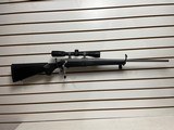 Used Ruger M77 Hawkeye 243 winchester23" barrelnikon buckmaster scope black synthetic stock good condition - 11 of 21