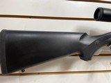Used Ruger M77 Hawkeye 243 winchester23" barrelnikon buckmaster scope black synthetic stock good condition - 14 of 21
