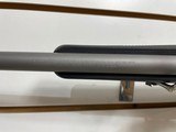 Used Ruger M77 Hawkeye 243 winchester23" barrelnikon buckmaster scope black synthetic stock good condition - 17 of 21