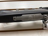 Used Ruger M77 Hawkeye 243 winchester23" barrelnikon buckmaster scope black synthetic stock good condition - 21 of 21