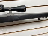 Used Ruger M77 Hawkeye 243 winchester23" barrelnikon buckmaster scope black synthetic stock good condition - 20 of 21