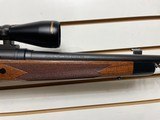 Lightly used savage 114 300 winchester 24" barrel nikon buckmaster scope very good condition - 3 of 21