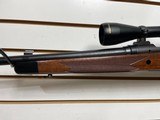 Lightly used savage 114 300 winchester 24" barrel nikon buckmaster scope very good condition - 7 of 21