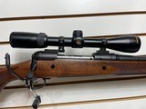 Lightly used savage 114 300 winchester 24" barrel nikon buckmaster scope very good condition - 2 of 21