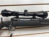 Used Savage Axis 243 win21" barrel bushnell 3x9-40 scope with covers black synthetic stock good condition - 7 of 24