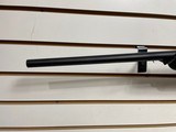 Used Savage Axis 243 win21" barrel bushnell 3x9-40 scope with covers black synthetic stock good condition - 12 of 24