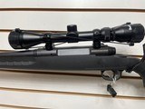 Used Savage Axis 243 win21" barrel bushnell 3x9-40 scope with covers black synthetic stock good condition - 11 of 24