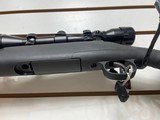 Used Savage Axis 243 win21" barrel bushnell 3x9-40 scope with covers black synthetic stock good condition - 16 of 24