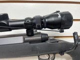 Used Savage Axis 243 win21" barrel bushnell 3x9-40 scope with covers black synthetic stock good condition - 4 of 24