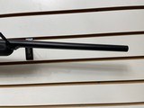 Used Savage Axis 243 win21" barrel bushnell 3x9-40 scope with covers black synthetic stock good condition - 24 of 24