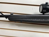 Used Savage Axis 243 win21" barrel bushnell 3x9-40 scope with covers black synthetic stock good condition - 10 of 24