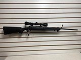 Used Savage Axis 243 win21" barrel bushnell 3x9-40 scope with covers black synthetic stock good condition - 9 of 24
