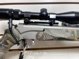 Used T/C Encore 209x50 26" barrel marine finish swift scope good condition - 24 of 25