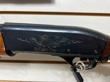 Used Remington 1100 12 gauge 21 " smooth bore deer barrel + 28" field barrel fixed choke modwith leather strap good working condition - 18 of 25
