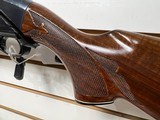 Used Remington 1100 12 gauge 21 " smooth bore deer barrel + 28" field barrel fixed choke modwith leather strap good working condition - 7 of 25