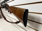 Used Remington 1100 12 gauge 21 " smooth bore deer barrel + 28" field barrel fixed choke modwith leather strap good working condition - 9 of 25